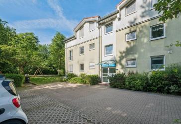 Sehr hübsche 3-Zimmer Eigentumswohnung mit Balkon und Tiefgarage