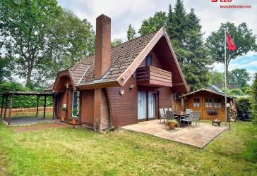 Den Sommer am eigenen Strand genießen - Gemütliches Ferienhaus am Badesee in Karlshof