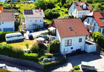 Wohnen mit Aussicht - Gepflegtes Einfamilienhaus mit Einliegerwohnung und vielseitigen Möglichkeiten in 61389 Schmitten