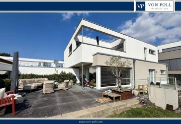 Moderne Erdgeschoss- Wohnung mit Terrasse und Gartenanteil