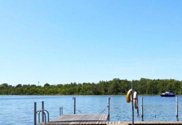 Direkte Wasserlage in Berlin: Exklusives Haus am See mit Bootssteg, Sauna & A+ Energieeffizienz