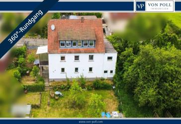 VON POLL | Zweifamilienhaus mit großzügigem Grundstück und vielseitigem Entwicklungspotenzial