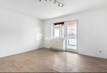 Helle Drei-Zimmer-Wohnung mit durchdachtem Grundriss und Balkon in gepflegtem Mehrfamilienhaus