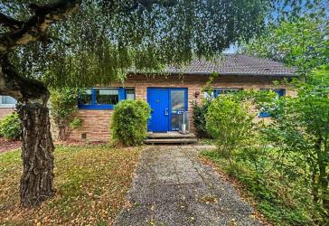 Raumwunder mit Gartenidylle: Reihenendhaus in bester Lage Hasbergens