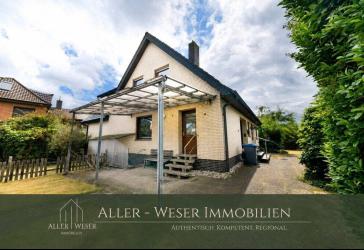 Langwedel | Großzügiges Wohnhaus mit Garten, Keller und Garage sowie aktuell vermietetem Obergeschoss