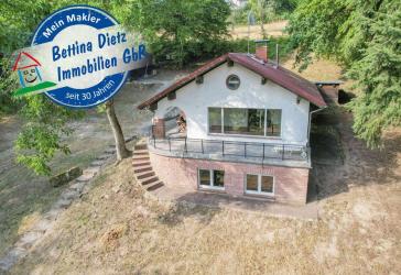 DIETZ: EFH auf einem 2.667m² großem naturnahen Grundstück in Bad König in Alleinlage. Sofort frei!
