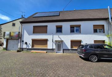 Zwei attraktive Wohneinheiten in historischem Dreiparteienhaus in Mettweiler