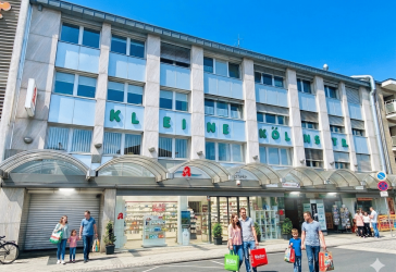 7,6 % Rendite - Wohn-/Geschäftsobjekt im Zentrum mit Ladenpassage und Tiefgarage - voll vermietet