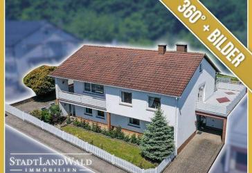 Einziehen und wohlfühlen - Gepflegtes Einfamilienwohnhaus mit Sonnenterrasse und Blick ins Grüne