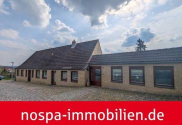 Stadthaus mit Potenzial! Wohnhaus mit vermieteter Einliegerwohnung und Garage