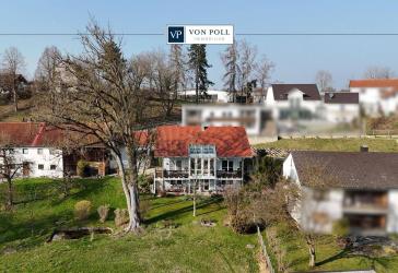 Wo Natur, Licht und Holz den Wohnraum prägen - Einfamilienhaus mit Wintergarten und Gartenidylle