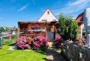 Ein-/Zweifamilienhaus mit Gartenidylle und Ausbaupotential in Werl-Büderich zu verkaufen!