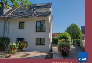 Ein Zuhause mit außergewöhnlichen Möglichkeiten - stilvolles Zweifamilienhaus in Frankfurt-Harheim