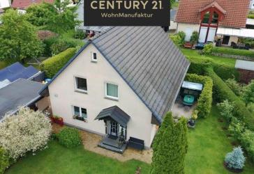 Charmantes Einfamilienhaus mit liebevoll angelegtem Garten und viel Platz für die ganze Familie