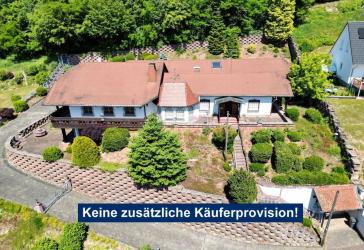 Beeindruckende Liegenschaft mit Chalet-Charakter, direkter Waldrandlage und herrlichem Fernblick