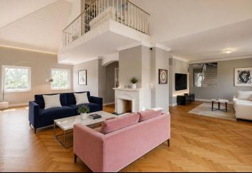 Haus-im-Haus-Wohnung mit Dachterrasse, Kamin und Doppelgarage am Lerchesberg