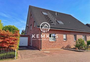 Gepflegte Doppelhaushälfte mit sonnigem Garten, Kamin und PV-Anlage