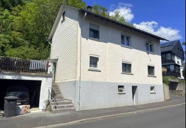 Gemütliches Einfamilienhaus mit kleinem Garten, Terrasse und Garage in zentraler Lage von Westerburg
