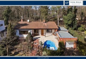 Bungalow mit Pool und wunderschönem Garten in ruhiger, bevorzugter Lage