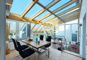 Exklusive EG - Wohnung mit Wintergarten, Wellnessbereich & mediterranem Garten in Aachen-Brand!