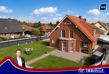Einziehen und wohlfühlen: Familienfreundliches Haus mit Garten, Terrasse und Carport