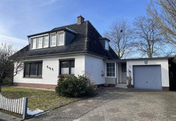 Grundsolides Einfamilienhaus mitten in der Stadt