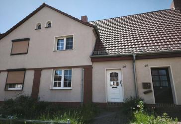 Schönes Reihenhaus in historischer Werkssiedlung Zschornewitz mit Fertigstellungsbedarf
