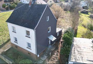 Haus mit Baugrundstück in Top Lage