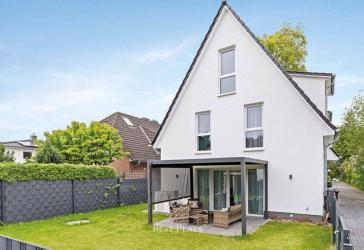 Attraktive Kapitalanlage: Vermietetes, lichtdurchflutetes Familiendomizil mit Terrasse und Garten