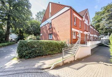 Großzügige Eigentumswohnung im Hausstil mit Terrasse, Garten & Garage