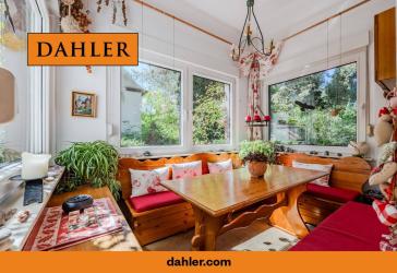 A well-maintained detached or semi-detached house with an idyllic garden