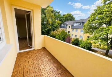Solide Kapitalanlage mit überzeugendem Grundriss, ruhigem Balkon und Garage