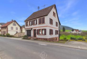 Einfamilienhaus in naturnaher Lage mit kleinem Garten und großzügigem Raumangebot
