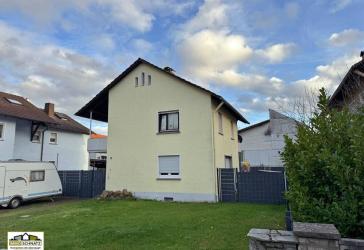 Charmantes Einfamilienhaus in Erlenbach mit Garten und Garage