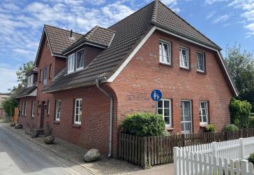 Erdgeschosswohnung in Wrixum mit Garten, Garage und PKW-Stellplatz