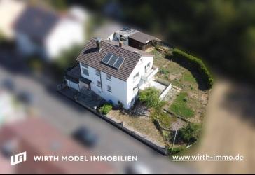 Einfamilienhaus mit Garage und Garten in schöner Ortsrandlage in Poppenhausen-Hain