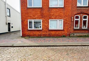 Historischer Charme trifft auf Potenzial - Einfamilienhaus mit Garten im Herzen von Husum