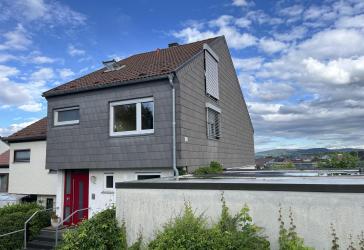 Reiheneckhaus mit Dachterrasse & Panoramablick – heller Traum für Familien